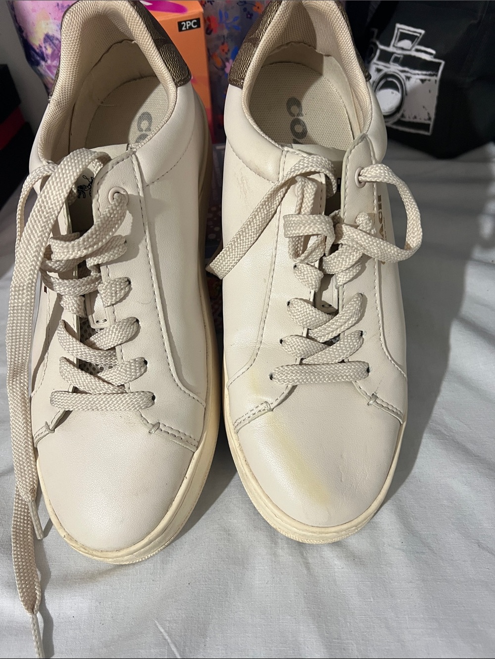 Coach Cream-White Sneakers with Gold Logo